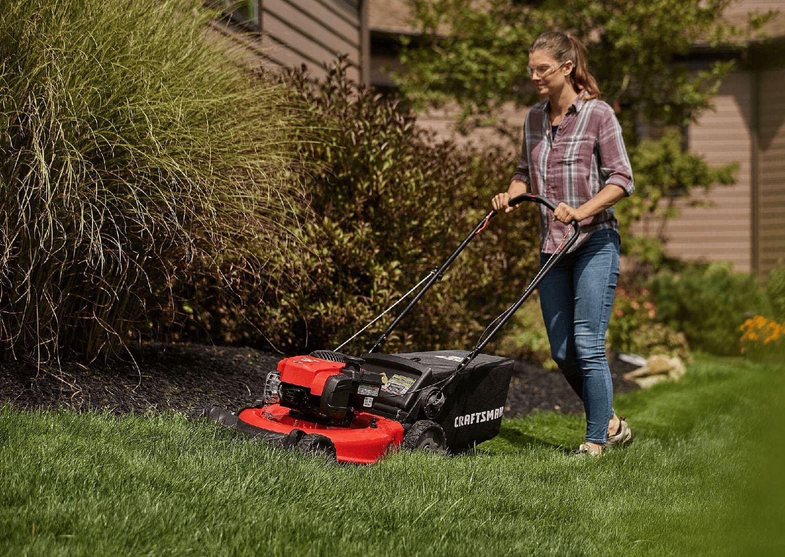 Craftsman push mower in action on a suburban lawn